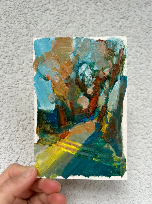 Crosswalk in sunset light in Bienne. 7x12 cm